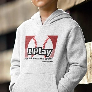 May include: A gray hooded sweatshirt with a red and white baseball graphic and the text "I Play for an Audience of One. Colossians 3:23".