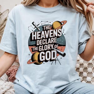 The Heavens Declare the Glory of God T-Shirt | Space Planets Celestial Scripture Design | Outer Space Astronomy Tee for Science Fan