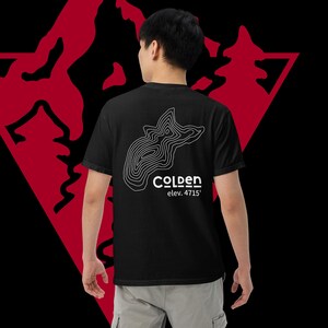 May include: Black t-shirt with a white outline of a mountain range and the text "Colden elev. 4715'" on the back.