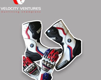 May include: White and black motorcycle boots and gloves with red and blue accents. The boots and gloves have the BMW logo. The image also includes the text "Velocity Ventures Outfitting champions".