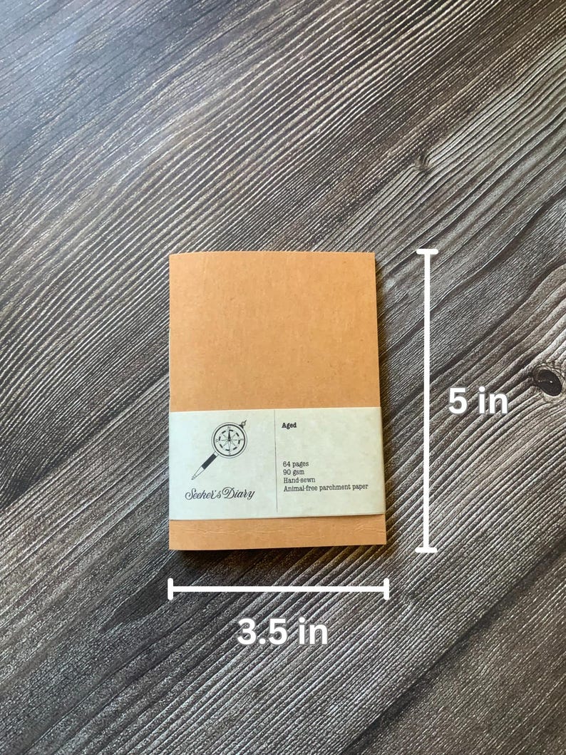 One passport size travelers notebook insert.  The covers are made of a brown vegan leather, also known as washable paper.  It has a smooth texture on one side and a rougher texture on the other side.  The height is 5 in. and the width is 3.5 in.
