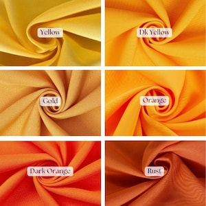 May include: A collection of six fabric swatches in shades of yellow, gold, orange, and rust. Each swatch is labeled with its color name: Yellow, Dk Yellow, Gold, Orange, Dark Orange, and Rust. The fabric appears to be lightweight and flowing.