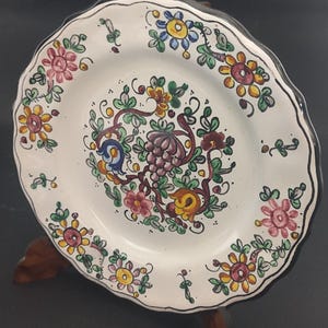 Gubbio ceramic plate, Biagioni from 1945, signed on the back. Flower and leaf decorations are coloured.