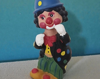 Large terracotta clown that moves its head attached to a spring (game from the 50s)