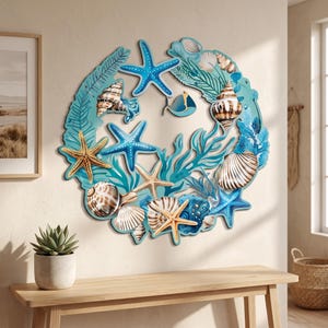 May include: A decorative wall wreath featuring a circular design with a light blue background. The wreath is adorned with various seashells, starfish, and aquatic plants in shades of blue, white, and brown. The wreath is mounted on a light-colored wall.