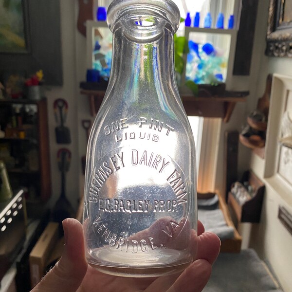 Early Embossed Guernsey Dairy Farm - E. G. Bagley Prop. - Kenbridge, Virginia Pint Milk Bottle - Sealed BB 48