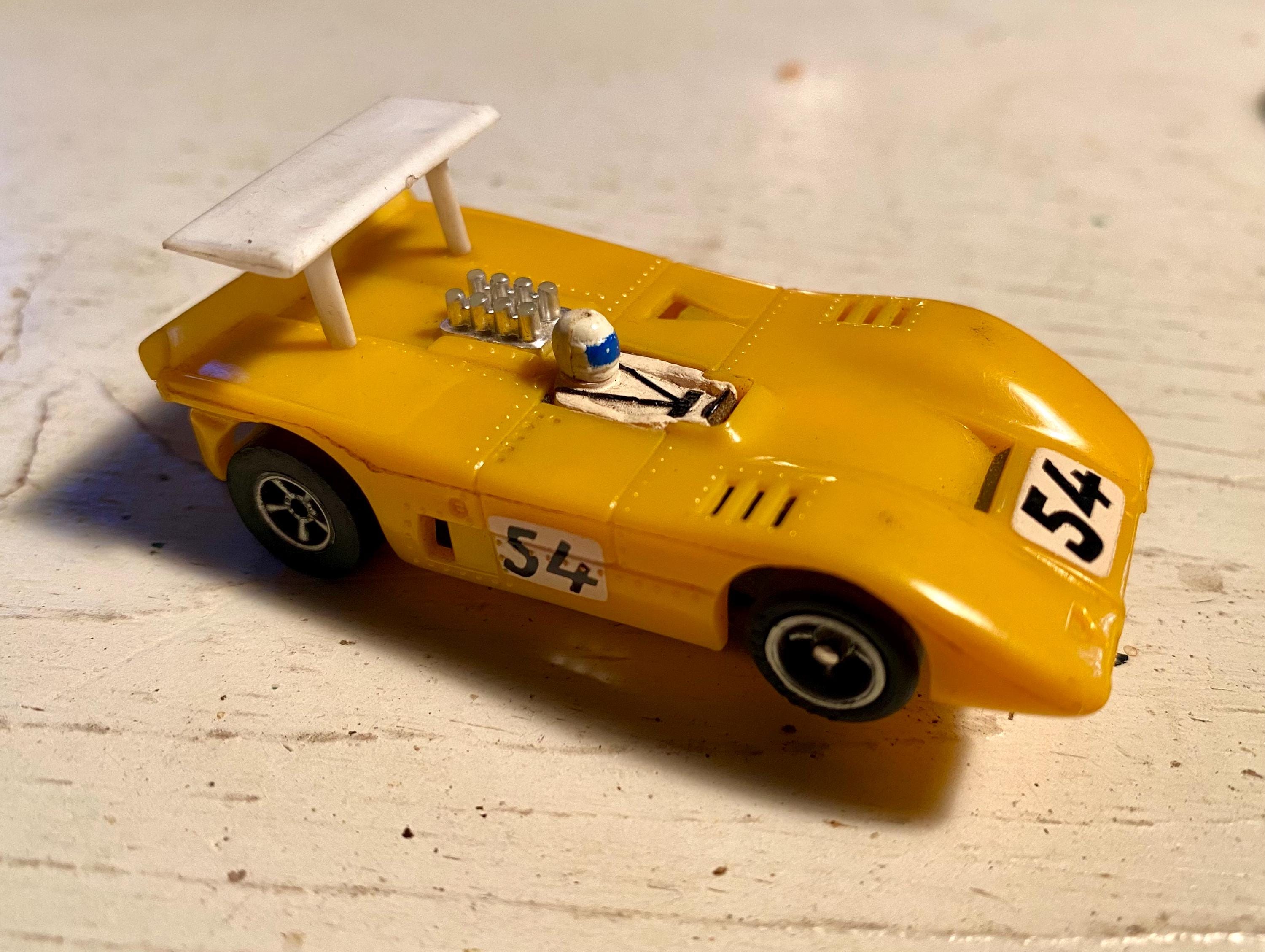 Working Aurora AFX Mclaren XLR Solid Yellow #54 HO Slot Car With