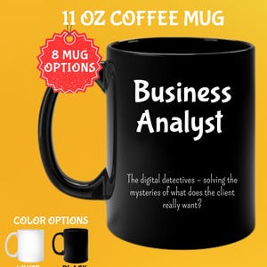 May include: Black 325 ml coffee mug with the text "Business Analyst" in white. The mug also has the text "The digital detectives - solving the mysteries of what does the client really want?" and is available in white and black.