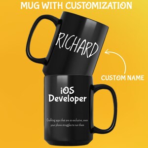 May include: Two black coffee mugs, one stacked on top of the other. The top mug has the name "RICHARD" in white script. The bottom mug says "iOS Developer" with a quote below. The background is yellow.
