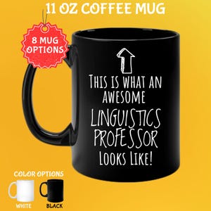 May include: Black 11 oz coffee mug with the text "THIS IS WHAT AN AWESOME LINGUISTICS PROFESSOR LOOKS LIKE!" in white. The mug has a black handle and the image shows color options: white and black.