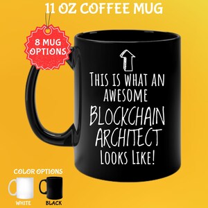 May include: Black 11 oz coffee mug with the text "THIS IS WHAT AN AWESOME BLOCKCHAIN ARCHITECT LOOKS LIKE!" in white. The mug has a black handle and the image shows white and black color options.