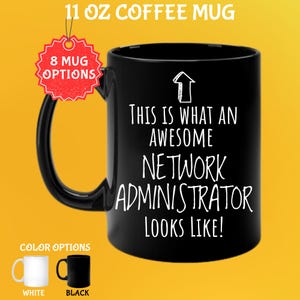 May include: Black 11 oz coffee mug with the text "THIS IS WHAT AN AWESOME NETWORK ADMINISTRATOR LOOKS LIKE!" in white. The mug has a black handle and is shown with white and black color options. A red tag says "8 MUG OPTIONS".