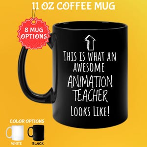 May include: Black 11 oz coffee mug with the text "THIS IS WHAT AN AWESOME ANIMATION TEACHER LOOKS LIKE!" in white. The mug has a black handle and a white arrow graphic. The image also shows color options and says "8 MUG OPTIONS".