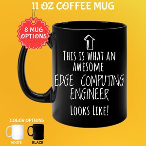 May include: Black 11 oz coffee mug with the text "THIS IS WHAT AN AWESOME EDGE COMPUTING ENGINEER LOOKS LIKE!" in white. The mug has a black handle and is shown with white and black color options.
