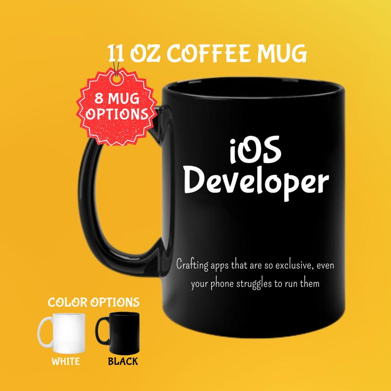 May include: Black 325 ml coffee mug with the text "iOS Developer" in white. The mug has a black handle and the text "Crafting apps that are so exclusive, even your phone struggles to run them". Color options are white and black.