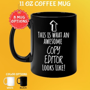 May include: Black 11 oz coffee mug with the text "THIS IS WHAT AN AWESOME COPY EDITOR LOOKS LIKE!" in white. The mug has a black handle and a white arrow graphic. Color options include white and black mugs.