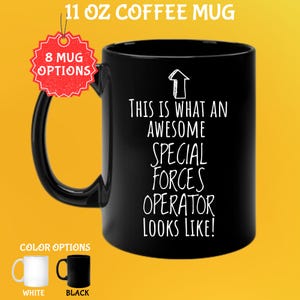 May include: Black 11 oz coffee mug with the text "THIS IS WHAT AN AWESOME SPECIAL FORCES OPERATOR LOOKS LIKE!" in white. The mug has a black handle and a white arrow graphic. Color options are white and black.
