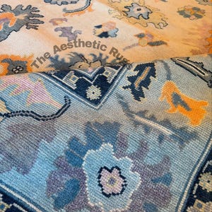 Hand Knotted Wool Oushak Rug: Blue Ivory Floral Carpet