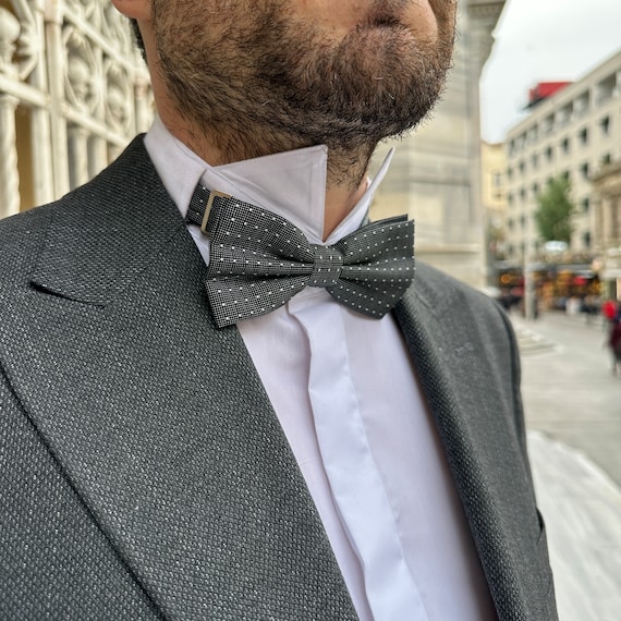 putting on a pre tied bow tie