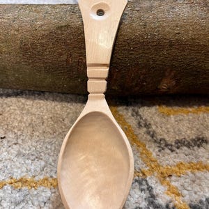 A hand carved eating spoon