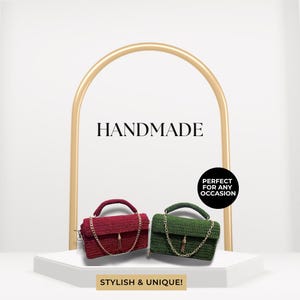 May include: Two handmade crocheted bags with gold chains and tassels. The bag on the left is red and the bag on the right is green. The bags are displayed on a white platform with a gold arch behind them. The text "HANDMADE" is displayed above the arch. The text "PERFECT FOR ANY OCCASION" is displayed in a circle below the bags. The text "STYLISH & UNIQUE!" is displayed below the platform.