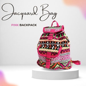 May include: A pink jacquard backpack with a geometric pattern in black, white, green, and orange. The bag has a flap closure with a buckle and a small front pocket. The text "Jacquard Bag" and "PINK BACKPACK" are visible.