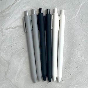 6 bolígrafos de gel minimalistas en negro, blanco y gris