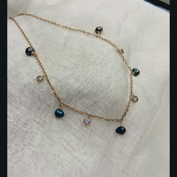 Collier perles d'eau douce et breloque en cristaux