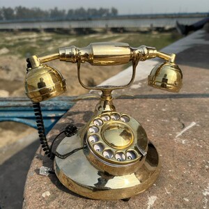 Nautical Brass Rotary Dial Working Telephone: A Victorian Office Elegance.