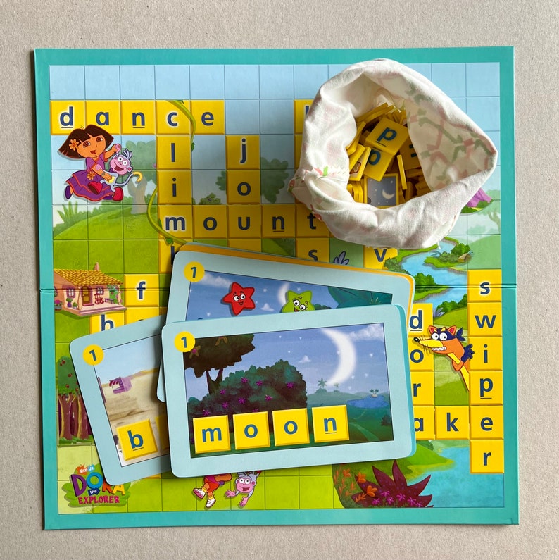 Dora the Explorer SCRABBLE Crossword Board Game: Mattel Games Magic of Dora the Explorer SCRABBLE Crossword Board Game: Mattel Games Magic of