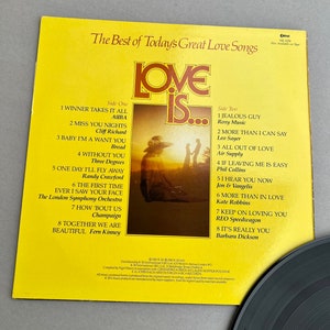 Love is: the best of great love songs, 12 in vinyl record by K-tel, Valentine's Day gift, ABBA, Three Degrees, Roxy Music, Phil Collins