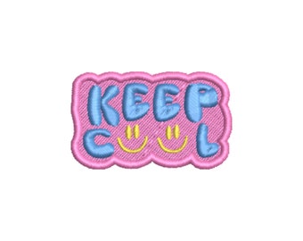 May include: Embroidered patch with the words "KEEP COOL" in light blue bubble letters. The patch has a pink background with a wavy border and two yellow smiley faces.