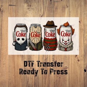 May include: A DTF transfer featuring four Diet Coke cans illustrated as horror characters. Each can displays the Diet Coke logo and depicts a different iconic slasher figure, including a masked character with a knife and a clown. Text reads DTF Transfer Ready To Press.