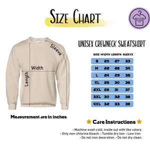 a white sweatshirt with measurements for a size chart