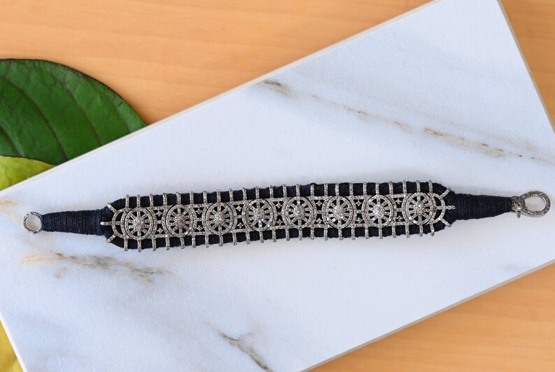 “Handmade pavé diamond hexagon macrame bracelet in 925 sterling silver with adjustable thread artisan jewelry”
pave diamond bracelet, hexagon macrame bracelet, handmade diamond bracelet, macrame diamond bracelet, geometric silver bracelet, 925 sterling silver bracelet, adjustable macrame bracelet, artisan silver jewelry, jaipur handmade jewelry, luxury boho bracelet, diamond bracelet women, gift for her jewelry, anniversary gift bracelet, wedding bracelet women, ethical diamond jewelry