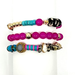 Turquoise, hot, pink, and black fall stack