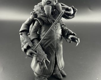 May include: A detailed grayscale action figure of a creature with a large head, multiple appendages, and a long coat. The figure holds a staff and has a textured, fur-like collar and cuffs. The figure's design suggests a fantasy or science fiction theme.