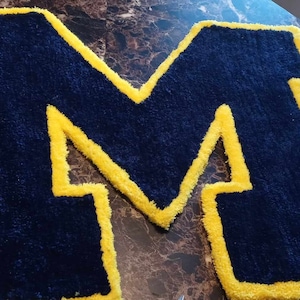 Michigan Wolverines hand tufted rug
