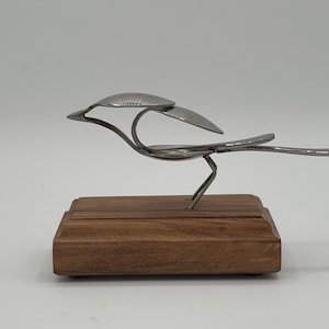 Spoon Bird Sculpture: Stainless Steel Nestling on Red Gum Wood