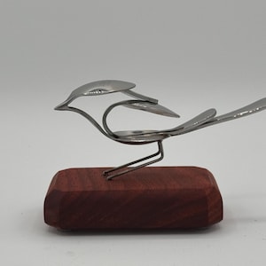 Spoon Bird Sculpture: Stainless Steel Nestling on Padauk Wood