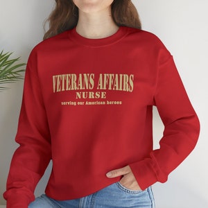 VA Nurse Sweatshirt Veterans Affairs Nurse Sweater Gift for Nurses Unique gift Ideas for Nurses is a Unisex Heavy Blend™ Crewneck Sweatshirt