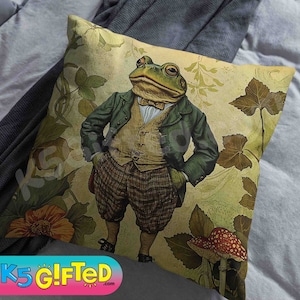 May include: A green frog wearing a suit and bow tie stands in a garden setting with green leaves and a red and white mushroom. The background is a vintage-style illustration.