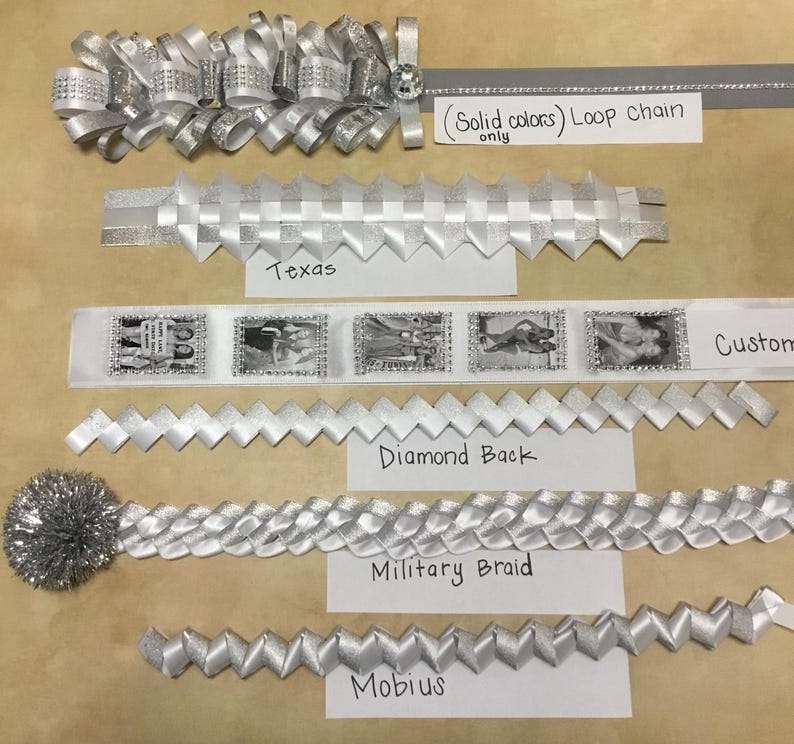 Loop chain- choose 2-3 solid colors,
custom photo chain-25” long featuring 5 mini wallet sized photos in either color or B&W.
Texas braid- select 3 colors.
Diamond Back, Military or mobius, select 2 colors.