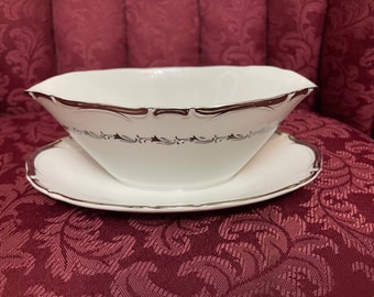 Collectible Fine Seyei China made in Japan Gravy Bowl. Never been used.Silver and White.Very Elegant and Decorative.”Marquis “Free Shipping.