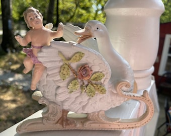 Antique/Vintage Bisque Cherub figurine riding a swan sleigh . The exquisite, handcrafted made in Germany . 1940-1950.Free shipping.