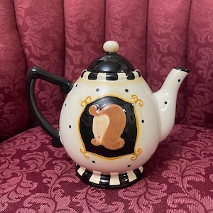 Vintage Art Nouveau Style Lady Face Tea Pot.Higly Glazed Ceramic Pottery style .about 7”tall and 8”wide.Great condition.Looks new.
