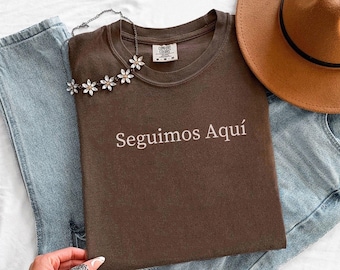 Trendy Seguimos Aquí Shirt, Proud Latinx T-shirt, Cultural Protest Tee, Hispanic Heritage Month Gift, Immigrant Rights Shirts, Comfort Color