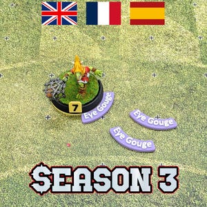 Pode incluir: Uma miniatura de um personagem de fantasia verde e vermelho, em uma base circular com o número 7. Há fichas roxas com "Eye Gouge" e o texto "SEASON 3". As bandeiras do Reino Unido, França e Espanha são visíveis.