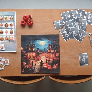 Halloween theme, Pumpkin who is it, Skeleton decoration + game and Halloween talking board