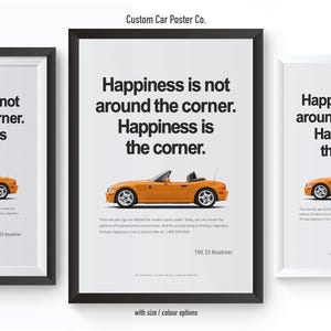 May include: Three framed posters with the text "Happiness is not around the corner. Happiness is the corner." Each poster features an orange convertible car. The text "THE Z3 Roadster" is below the car.